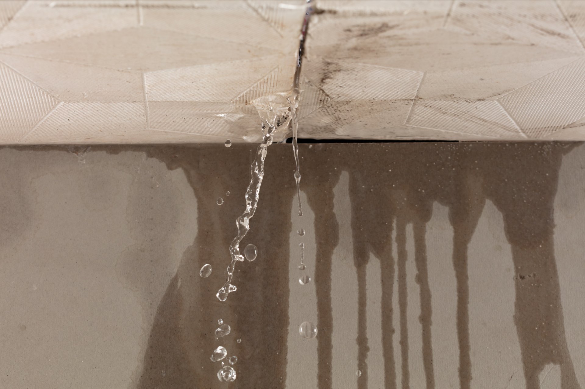 Property water damage - water leaking from ceiling